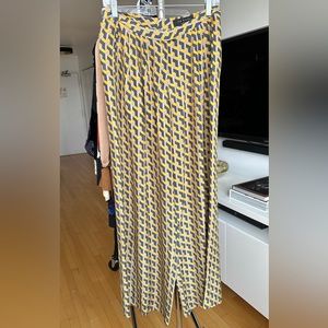 Rag & Bone silk satin pleated full-legged trousers with pockets.